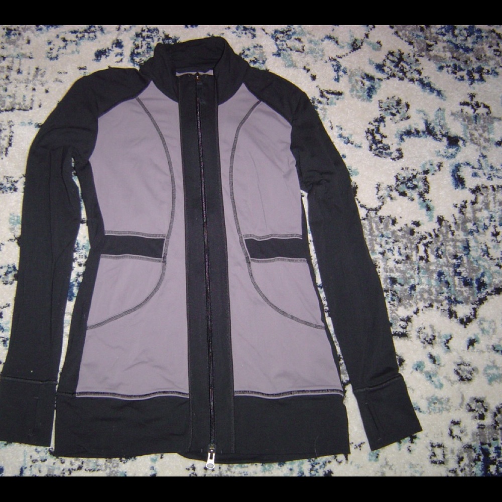 Lucy tech yoga jacket w/ pockets and thumb loops.